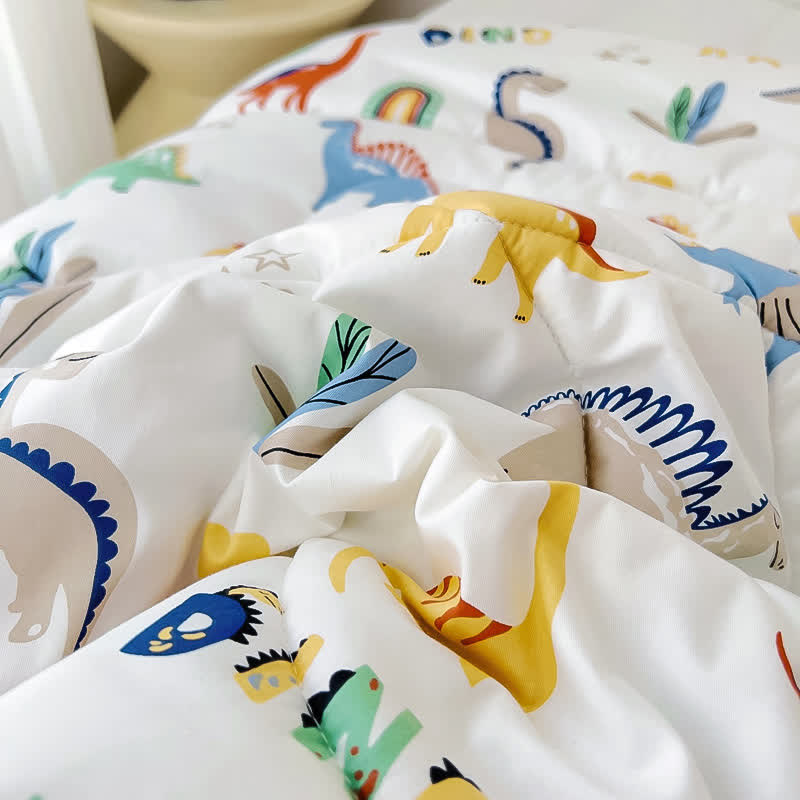 Cotton Dinosaur World Toddler Quilt