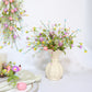 Easter Egg Branch with Green Leaves & Blossoms - image 1
