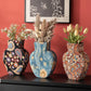 Artistic Fabric-Wrapped Vase for Home Aesthetics - image 1